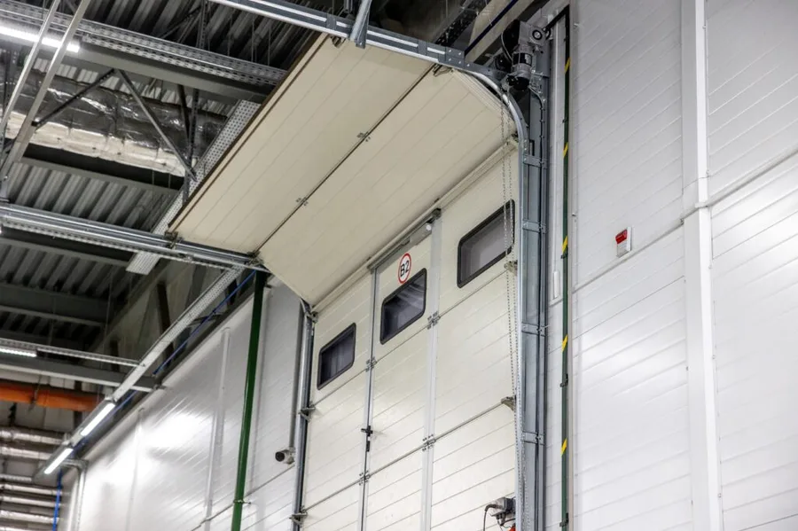 Commercial sectional overhead door inside a warehouse bay