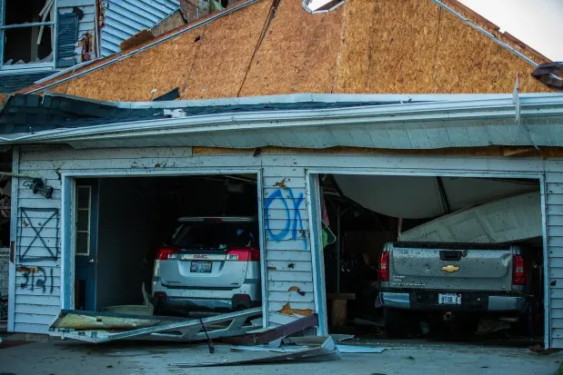 Garage doors torn open by severe storm winds